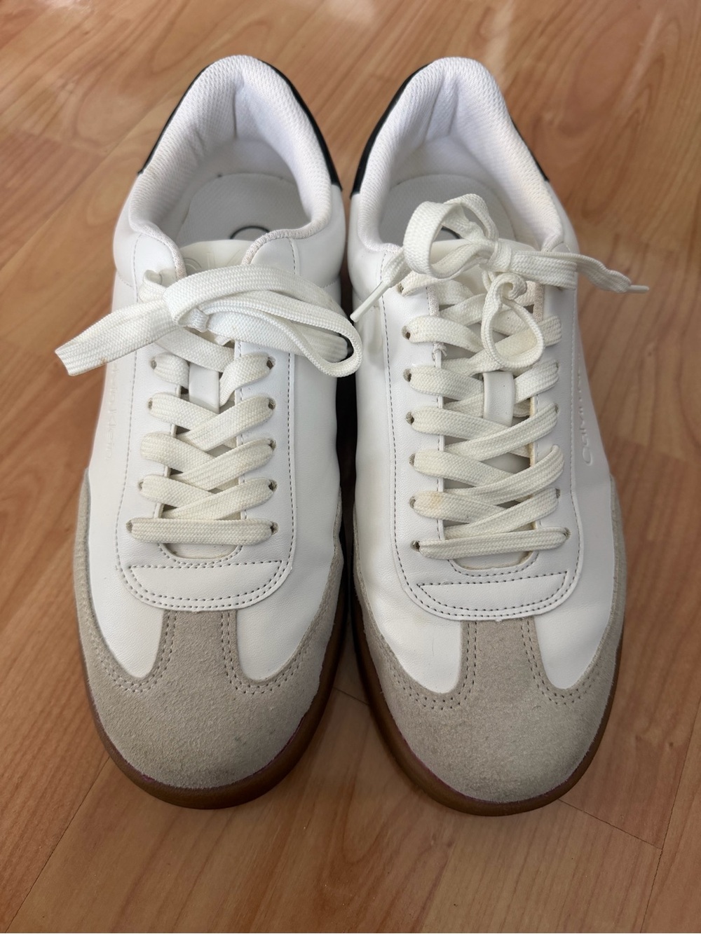 Calvin Klein White Leather Low-Top Sneakers with Black Heel and Gum Sole